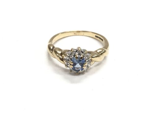 Gold 9ct ring with blue stone set. Total weight 2.3g and size K (approx)