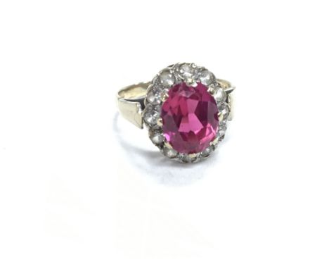 9ct gold ruby and diamond ring. Total weight 2.7g size J (approx)