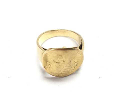 18ct worn half sovereign ring. Approximately 10.5g total.
