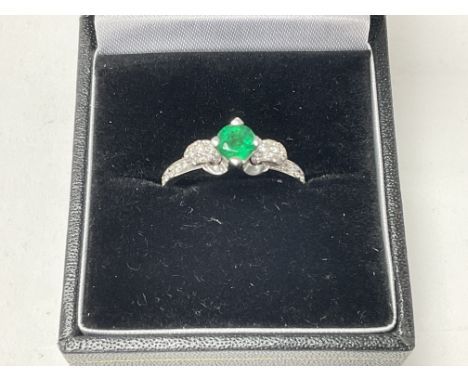 18ct emerald and diamond ring