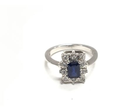 White gold Sapphire and diamond (illusion set) ring. Total weight 4.8g and Size N (approx).