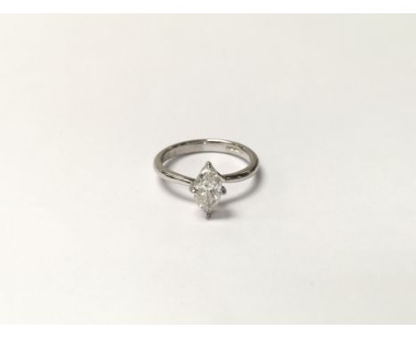 An 18ct while gold ring set with a 0.7ct marquise diamond. The approximate ring size is J.