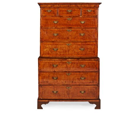 GEORGE II WALNUT CHEST-ON-CHEST EARLY 18TH CENTURY the moulded cornice above three short and three long cross and featherband