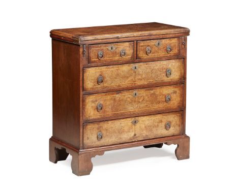 GEORGE I STYLE WALNUT BACHELOR'S CHEST EARLY 20TH CENTURY the fold-over top opening to a crossbanded and line inlaid interior