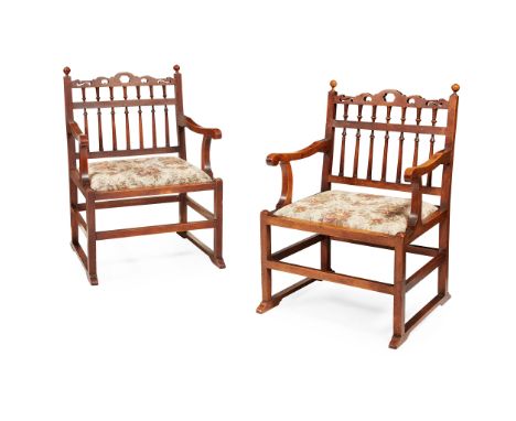 PAIR OF WALNUT NORTH COUNTRY 'DRUNKARDS' CHAIRS 18TH CENTURY each with a pierced toprail, above a spindle back and scrolled a
