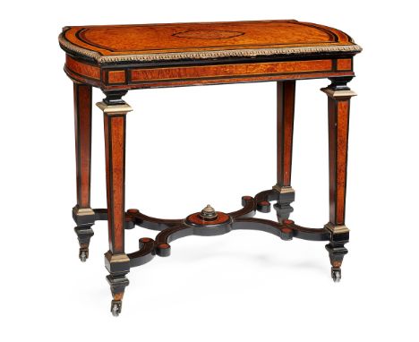 VICTORIAN GILT METAL MOUNTED AMBOYNA AND EBONISED CARD TABLE MID 19TH CENTURY with an inlaid and crossbanded swivel top, encl