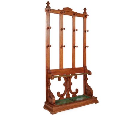 VICTORIAN OAK AND BRASS HALL STAND MID 19TH CENTURY the open frame back with twelve turned knob coat/hat pegs above a stick s