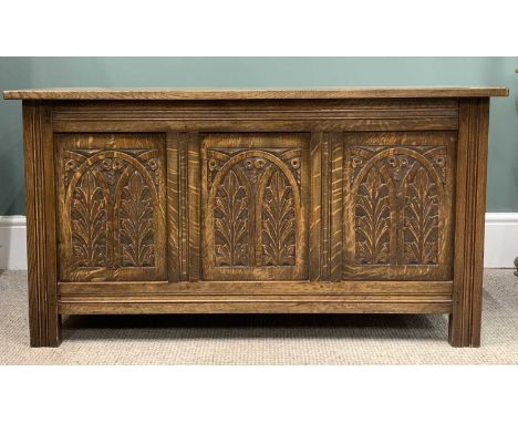POLISHED OAK BLANKET BOX with three carved panel front, 56 (h) x 105 (w) x 49 (d) cmsProvenance: Private collection Gwynedd