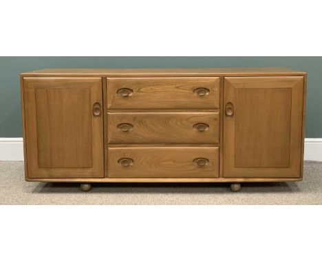LIGHT ERCOL SIDEBOARD with three central drawers including a cutlery tray, two cupboard doors, on castors, 69 (h) x 156 (w) x