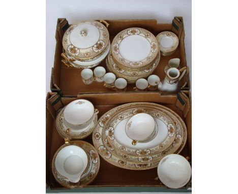 A Noritake six setting dinner and coffee service with gilt and cream foliate borders , comprising six dinner plates, six medi