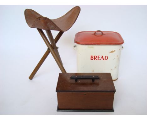 An enamel bread bin, a mahogany box and a folding tripod stool with leather seat (3). 