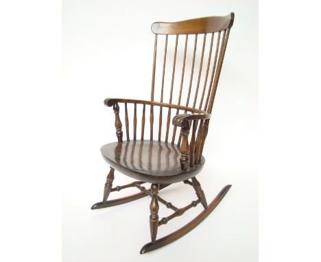 An Ercol style stick back ash rocking chair. 