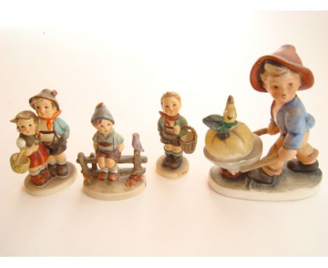 Four Goebel figurines, one a/f. 