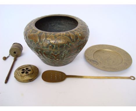 An Islamic brass planter, with repousse Islamic script decoration, a Tibetan copper and brass prayer wheel a/f, a 19th Centur