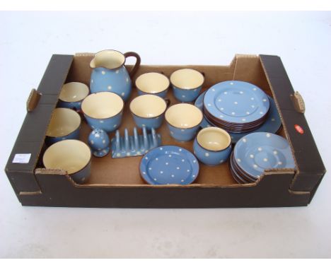 A Torquay Babbacombe pottery 'Polka dot' part breakfast set comprising three large teacups and saucers, four small tea cups a