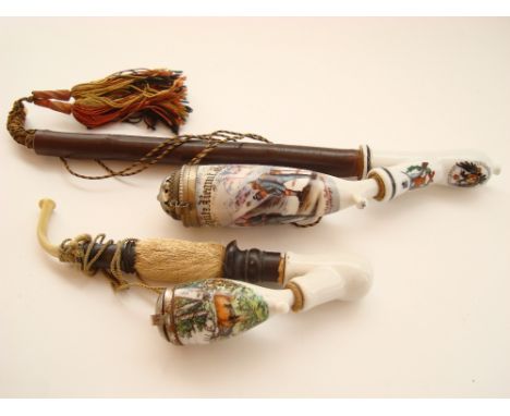 An early 20th Century Austrian porcelain pipe, the bowl decorated with the Kaisershutz Regmt Orient No 1 on patrol in Hochgeb