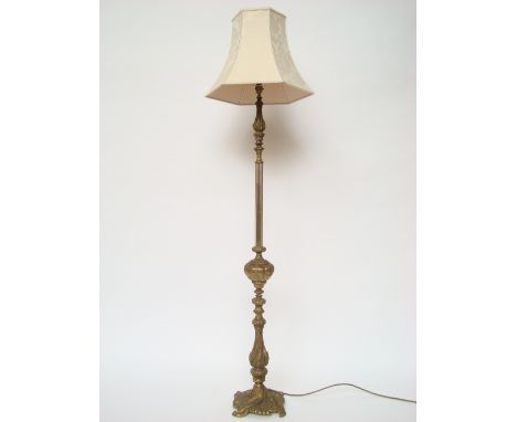 A gilt metal standard lamp. 
