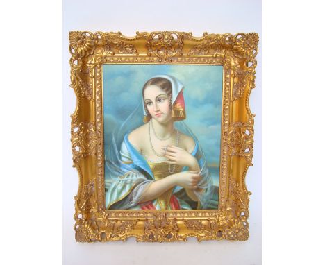 A 20th Century oil on canvas, a portrait of a woman in Renaissance dress, gilt gesso frame. 