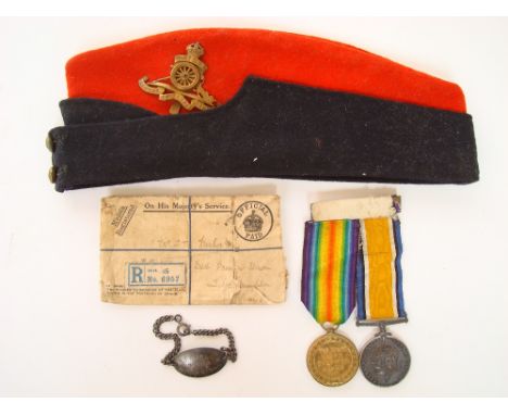 WWI medal group, awarded to 950039 GNR A. T. Parker R. A War medal and Victory medal together with a silver identification br