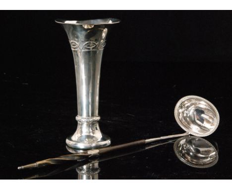 An Art and Crafts trumpet vase with diamond detail to foot collar and conforming decoration below border, marks rubbed, with 