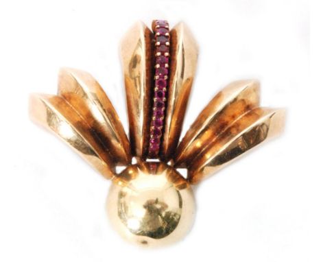An American clip brooch designed as a circular button with a three crescent shaped scrolled surmount, the central spray inset