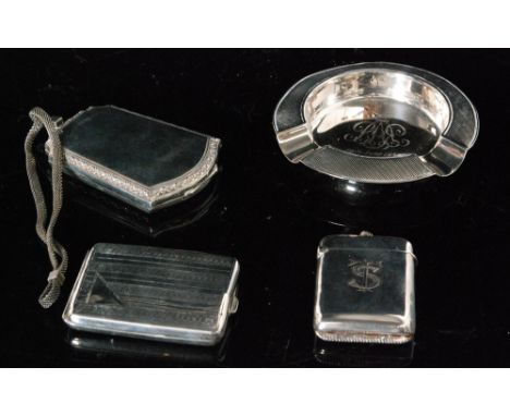 A continental white metal Art Deco compact and double sovereign case with engine turned decoration, unmarked, with a small as