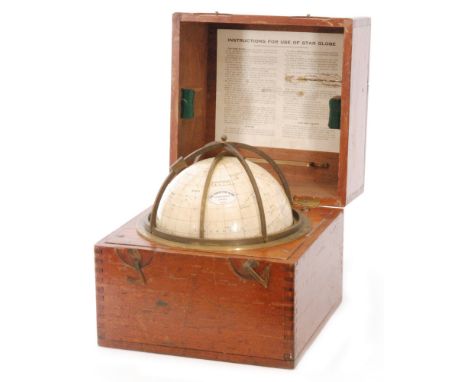  A 20th Century Husun Star celestial globe by H.Hughes & Son Ltd London 1920, in a mahogany case, width 26cm