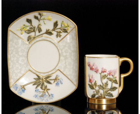 A late 19th Century Royal Worcester Aesthetic coffee can and saucer of squared form decorated with raised sprays of flowers f