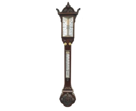 A Victorian carved walnut stick barometer by R bailey Birmingham with adjusting scale incorporating a thermometer below an ar