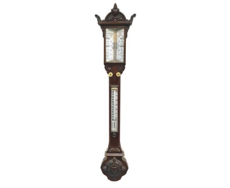 A Victorian carved walnut stick barometer by R bailey Birmingham with adjusting scale incorporating a thermometer below an ar