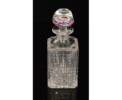 An early 20th Century clear crystal glass decanter in the manner of John Walsh Walsh, of square sleeve form with a grid of mi