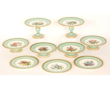 A 19th Century eighteen piece dessert service comprising twelve plates, four tazza and two comports, each with a hand painted