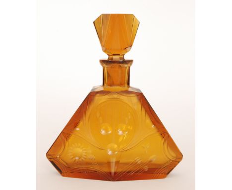 A 1930s Czech glass spirit decanter in the manner of Karel Palda, of faceted tapering form, decorated with stylised flower an