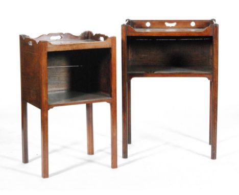 A mahogany open fronted commode or bedside cabinet in the Georgian style, with pierced grip handles to the galleried top over