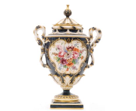 A large early 20th Century Royal Worcester shape 2340 twin handled pedestal vase and cover decorated by E Phillips with two h