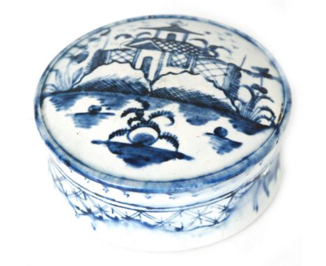 A late 18th Century Pearlware circular cosmetic or snuff box and cover, the lid and flat base decorated with a hand painted C
