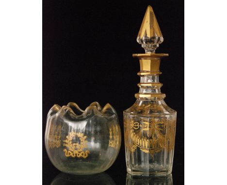 A late 19th Century Mont Joye glass vase of fluted globular form, decorated with gilt floral garlands, height 12cm, together 