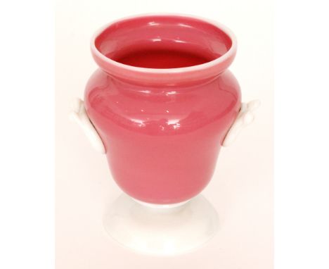 A late 19th Century rose alabaster vase of shouldered ovoid form with a collar rim, decorated with applied opal scroll handle