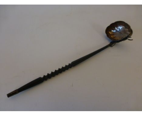 A silver ladle, Birmingham, 1977 