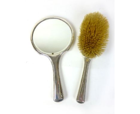 A silver brush and mirror with engine turned engraving, marks rubbed 