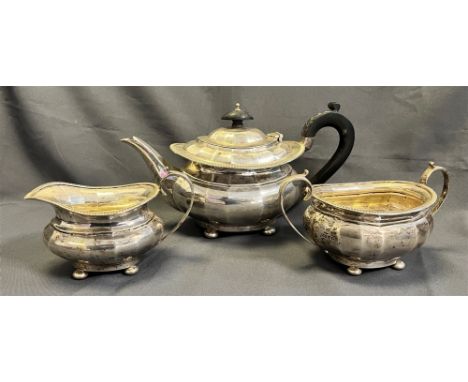 ART DECO SILVER TEA SERVICE with geometric detailing and gadrooned edging standing on orb feet, hallmarked Chester 1931.  Spo