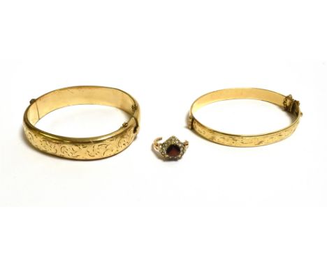 TWO ROLLED GOLD BANGLES &amp; 9CT GOLD RING one bangle 7.6mm wide with engraved front, stamped '9ct metal core' and one 12.7m