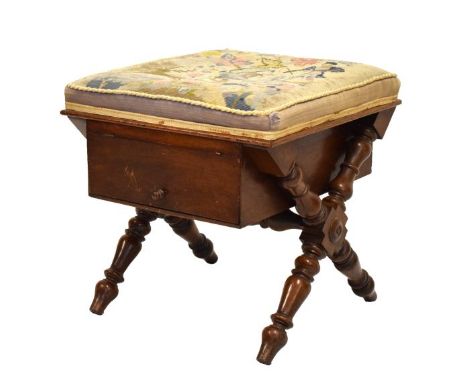 Late 19th/early 20th Century walnut framed stool with storage compartment below the seat, supported by X frame supports havin
