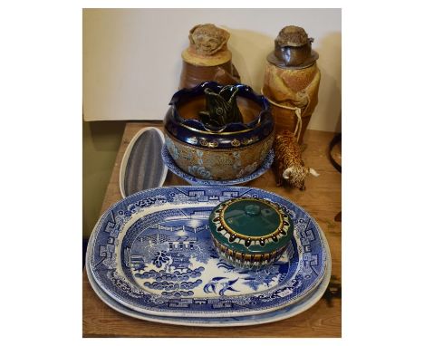 Two blue and white transfer printed willow pattern meat plates, a Doulton jardinière, a Poole pottery dish etc  