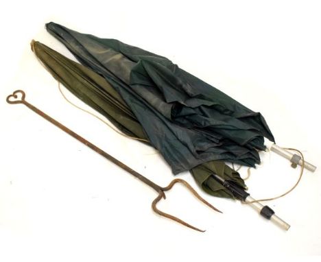 19th Century wrought iron log fork, together with a pair of parasols (3)  