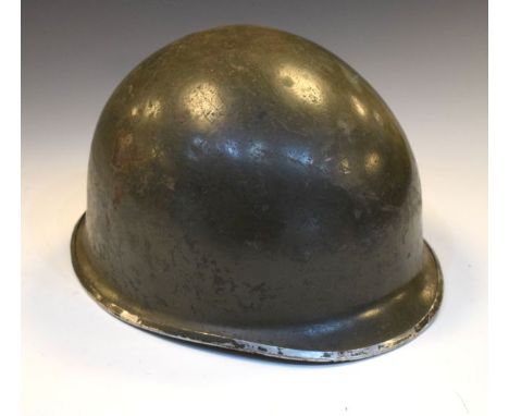 Post World War II Belgian Army steel Military helmet with interior shell liner, with flag of Belgium to the side  