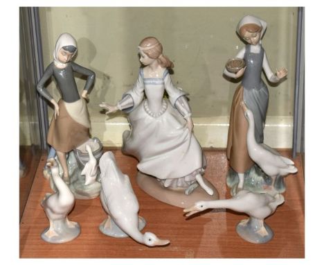 Five Lladro figures and one Nao goose, the tallest standing 24cm high  