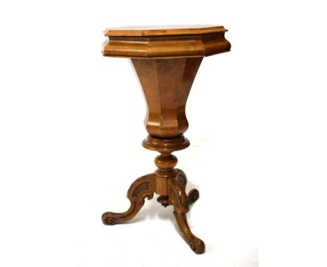Victorian figured walnut octagonal top lady's work table, the hinged cover revealing a partitioned and paper lined interior, 
