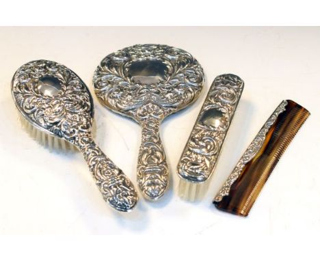 Elizabeth II silver four piece dressing table set to include; brushes, comb and mirror, Birmingham 1978/79  