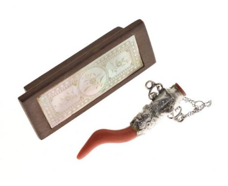 White metal and coral baby teether, together with a mother-of-pearl gaming counter  